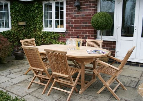 Image of Bentley Garden Teak 7 Piece Furniture Set With Oval Extendable Table