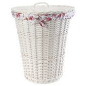White wicker laundry basket with floral lining