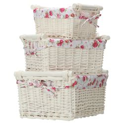 White wicker set of 3 baskets with wooden handles and floral lining