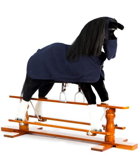 Image of Rocking Horse Shadow With Blue Rug And Nose Bag
