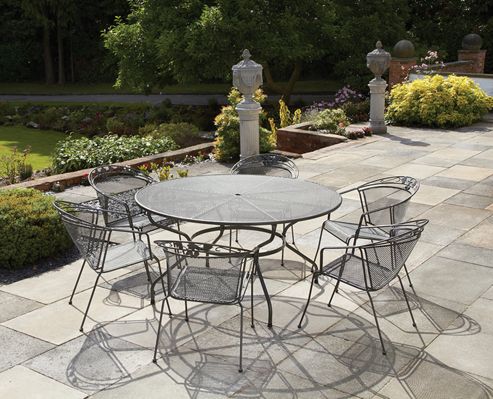 Image of Royal Garden Elegance 7-piece Round Garden Dining Set