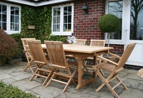 Image of Bentley Garden Teak 7 Piece Furniture Set With Rectangular Extendable Table