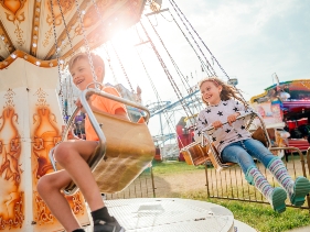 Children having fun on a swing