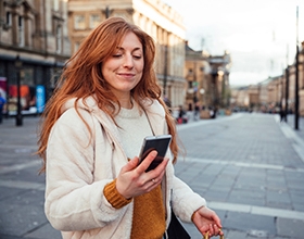 woman looking at phone